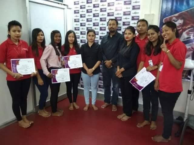 Students Holding Certificate – Veda Academy